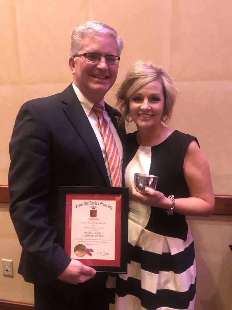 Mark and Paula Sparkman. Mark accepted the Distinguished Alumnus" award at the 2019 Atlanta Carlson.
